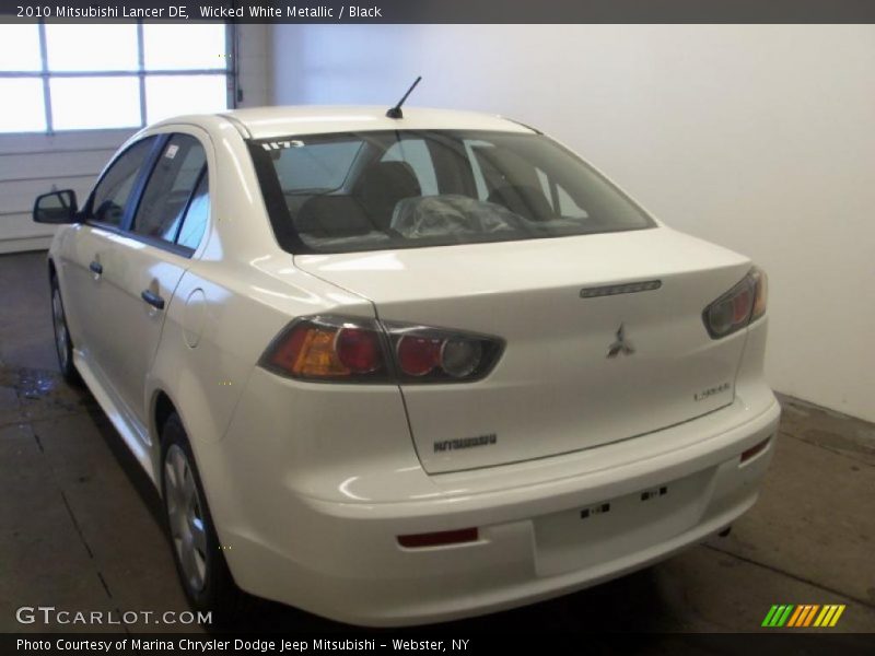 Wicked White Metallic / Black 2010 Mitsubishi Lancer DE