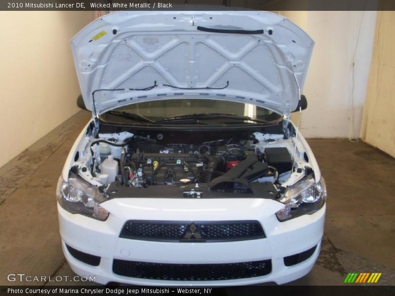 Wicked White Metallic / Black 2010 Mitsubishi Lancer DE