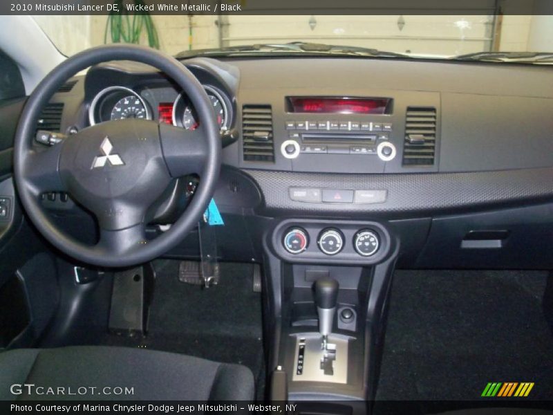 Wicked White Metallic / Black 2010 Mitsubishi Lancer DE