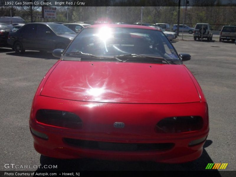 Bright Red / Gray 1992 Geo Storm GSi Coupe