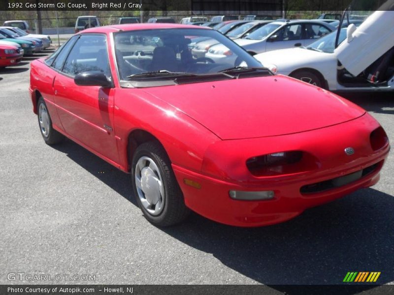 Bright Red / Gray 1992 Geo Storm GSi Coupe