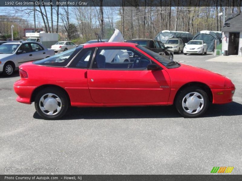 Bright Red / Gray 1992 Geo Storm GSi Coupe