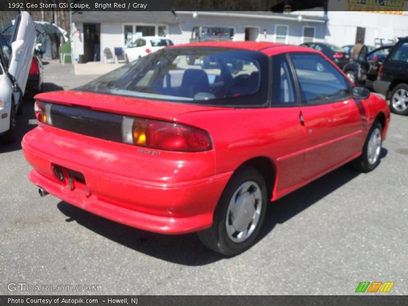 Bright Red / Gray 1992 Geo Storm GSi Coupe