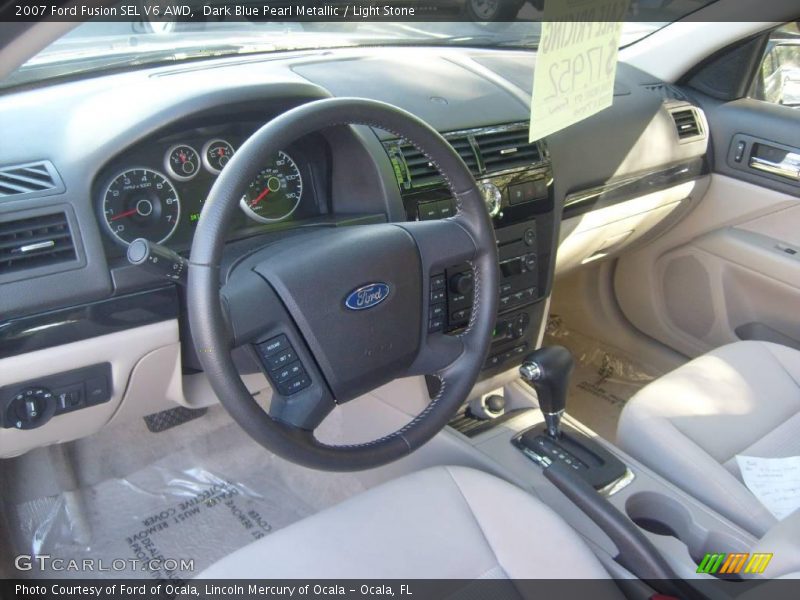 Dark Blue Pearl Metallic / Light Stone 2007 Ford Fusion SEL V6 AWD