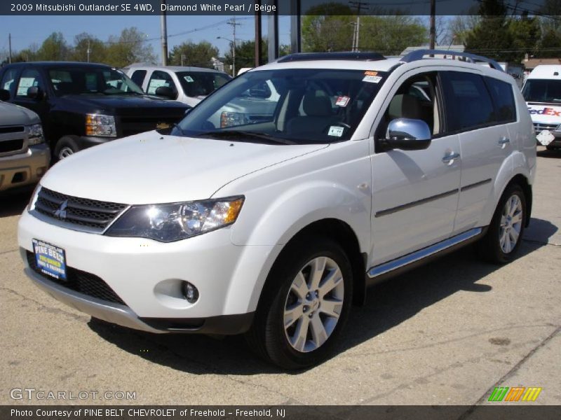 Diamond White Pearl / Beige 2009 Mitsubishi Outlander SE 4WD