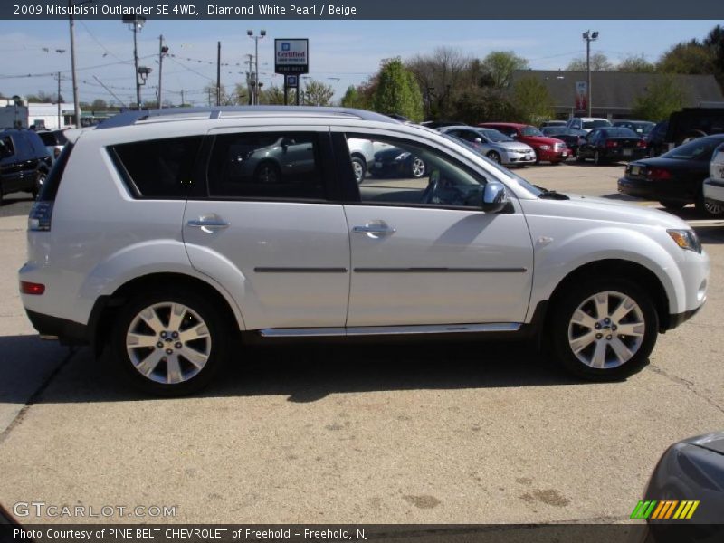 Diamond White Pearl / Beige 2009 Mitsubishi Outlander SE 4WD