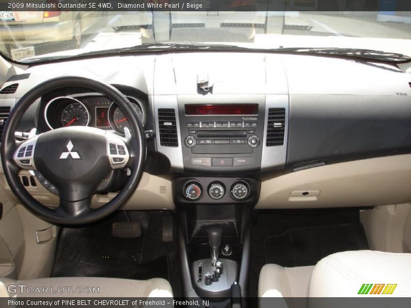 Diamond White Pearl / Beige 2009 Mitsubishi Outlander SE 4WD