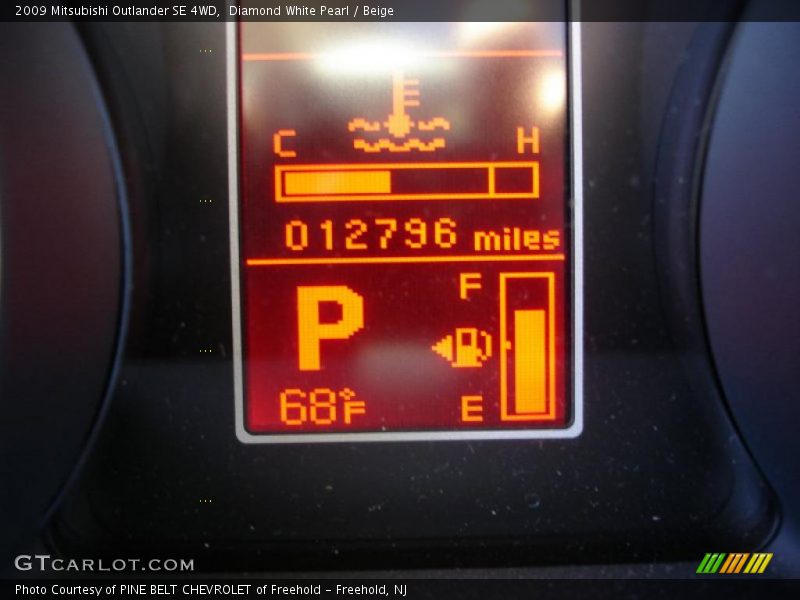Diamond White Pearl / Beige 2009 Mitsubishi Outlander SE 4WD