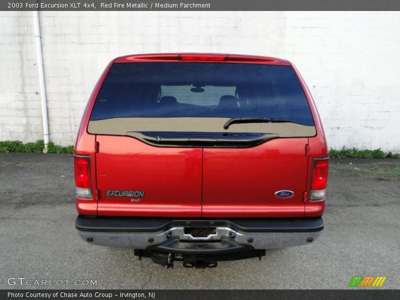 Red Fire Metallic / Medium Parchment 2003 Ford Excursion XLT 4x4