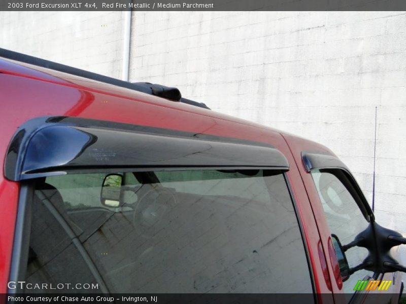 Red Fire Metallic / Medium Parchment 2003 Ford Excursion XLT 4x4