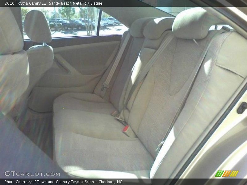 Sandy Beach Metallic / Bisque 2010 Toyota Camry LE