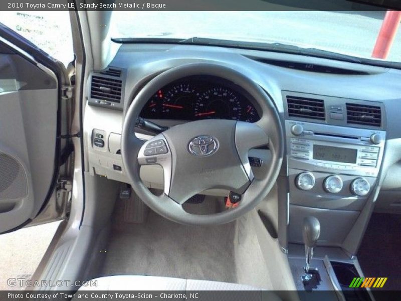 Sandy Beach Metallic / Bisque 2010 Toyota Camry LE