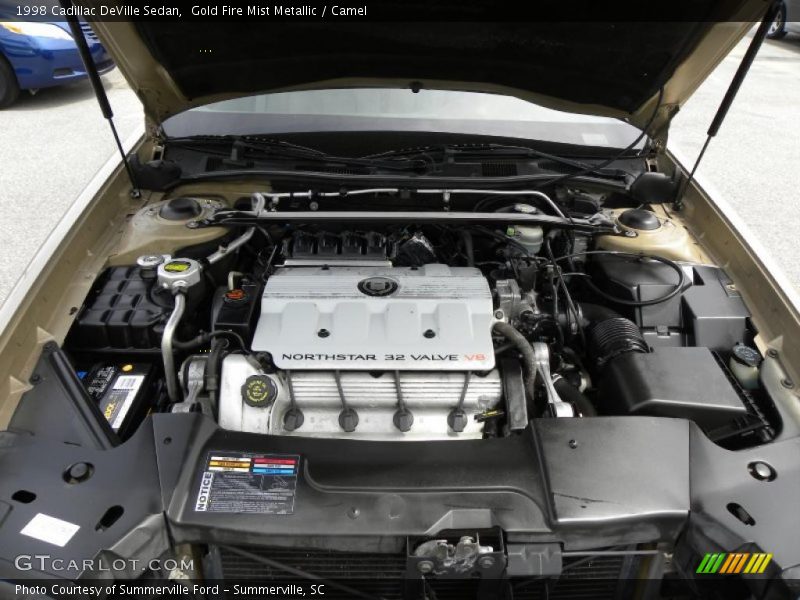 Gold Fire Mist Metallic / Camel 1998 Cadillac DeVille Sedan