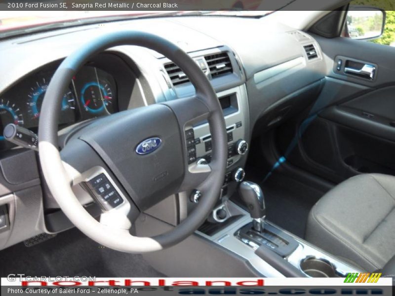 Sangria Red Metallic / Charcoal Black 2010 Ford Fusion SE