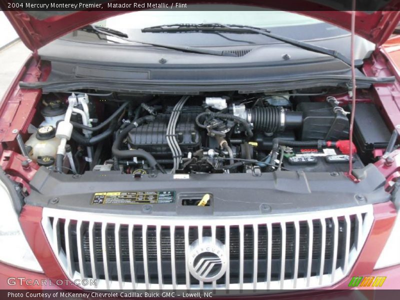 Matador Red Metallic / Flint 2004 Mercury Monterey Premier