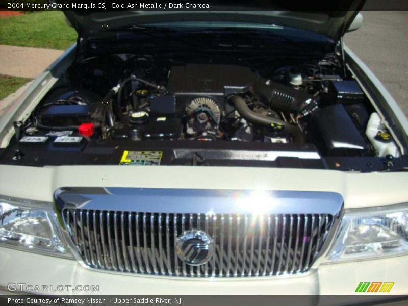 Gold Ash Metallic / Dark Charcoal 2004 Mercury Grand Marquis GS