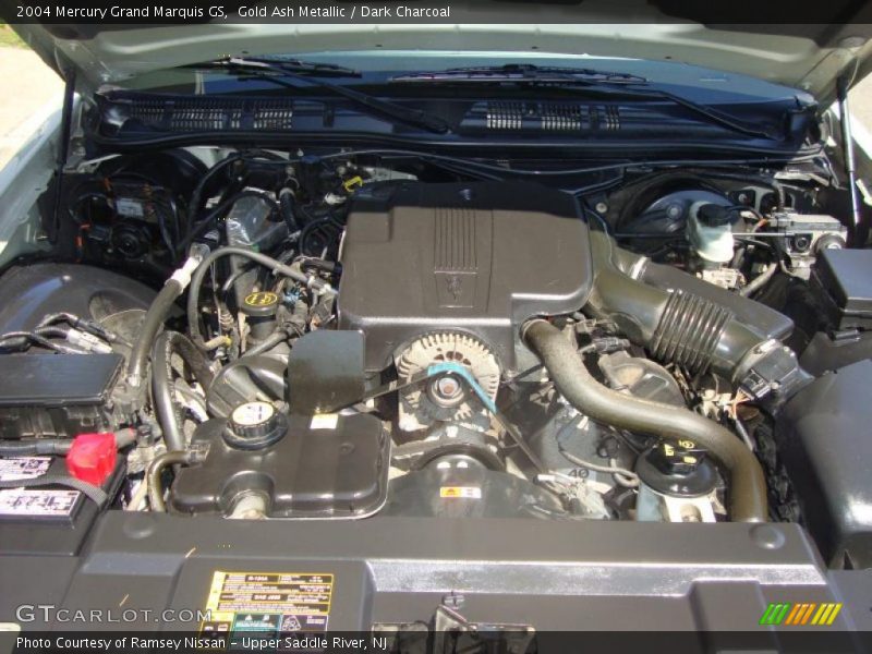 Gold Ash Metallic / Dark Charcoal 2004 Mercury Grand Marquis GS