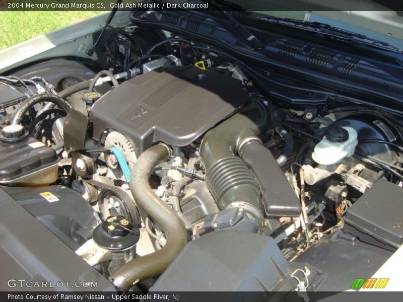 Gold Ash Metallic / Dark Charcoal 2004 Mercury Grand Marquis GS