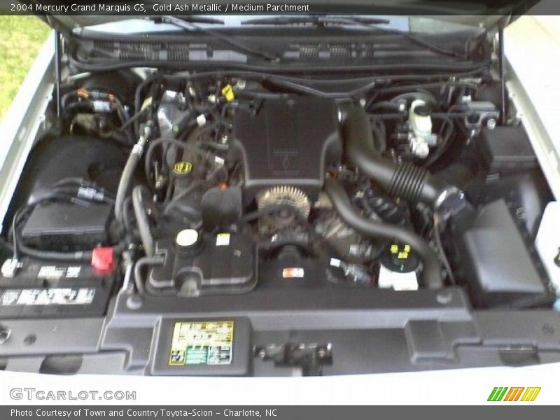 Gold Ash Metallic / Medium Parchment 2004 Mercury Grand Marquis GS