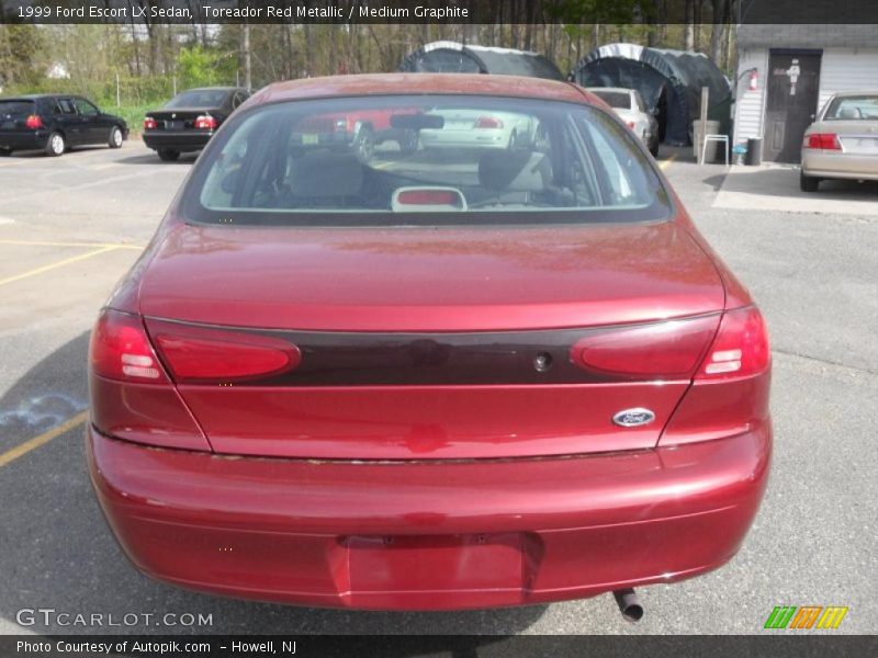Toreador Red Metallic / Medium Graphite 1999 Ford Escort LX Sedan