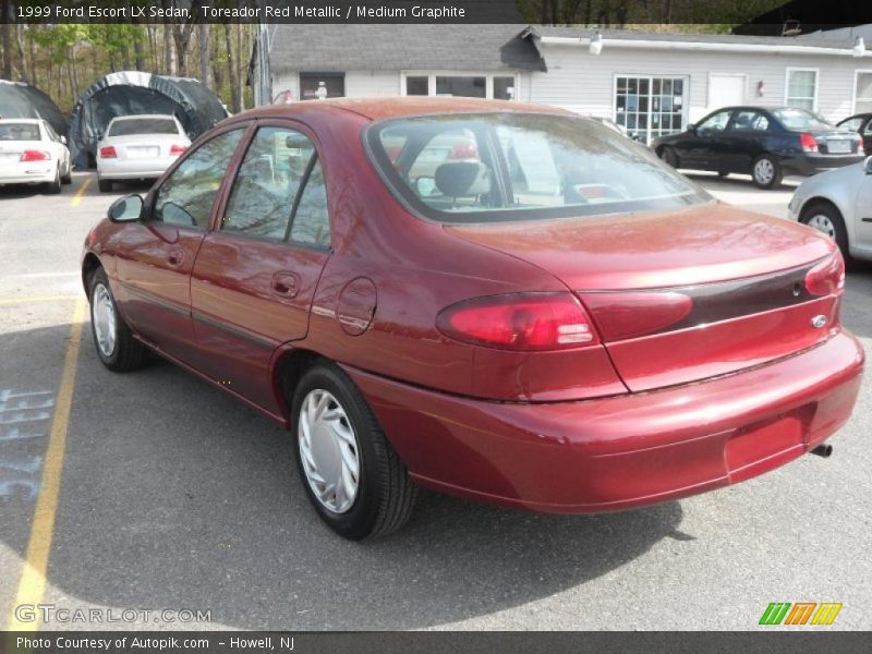 Toreador Red Metallic / Medium Graphite 1999 Ford Escort LX Sedan