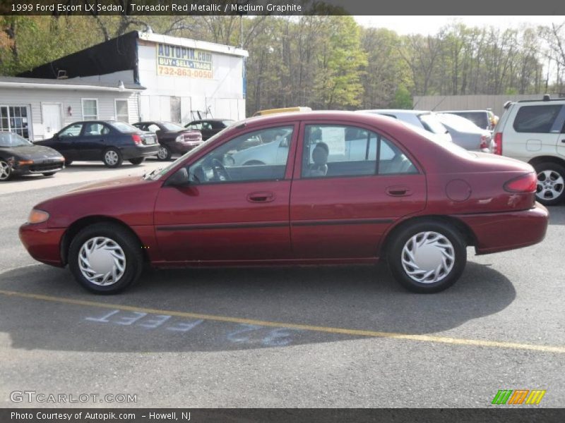 Toreador Red Metallic / Medium Graphite 1999 Ford Escort LX Sedan
