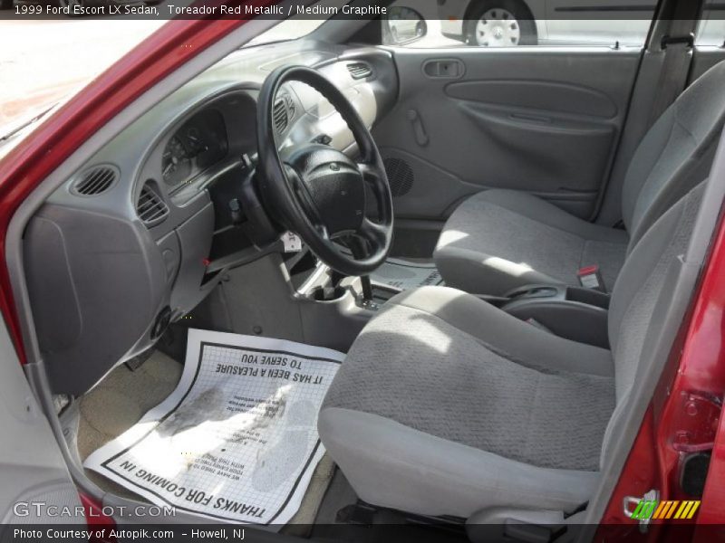 Toreador Red Metallic / Medium Graphite 1999 Ford Escort LX Sedan