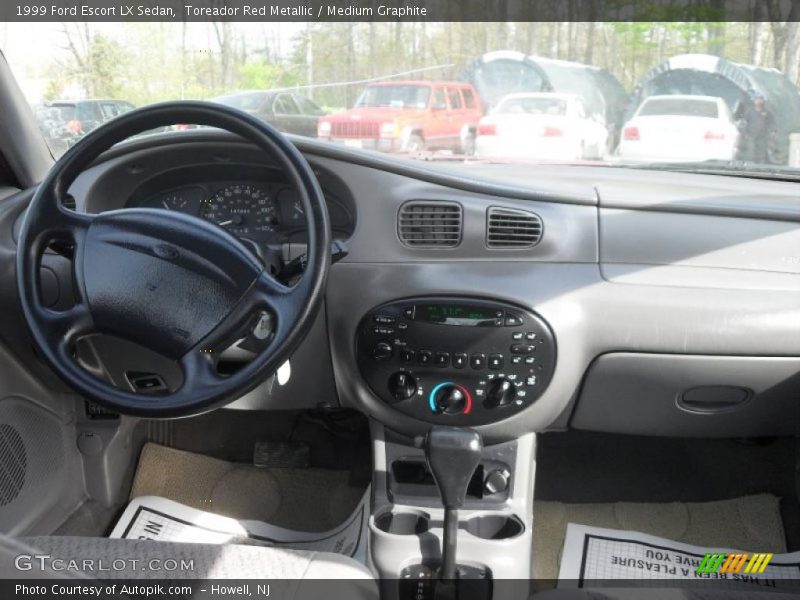 Toreador Red Metallic / Medium Graphite 1999 Ford Escort LX Sedan