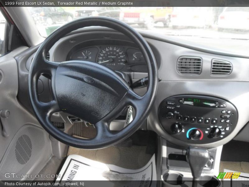 Toreador Red Metallic / Medium Graphite 1999 Ford Escort LX Sedan