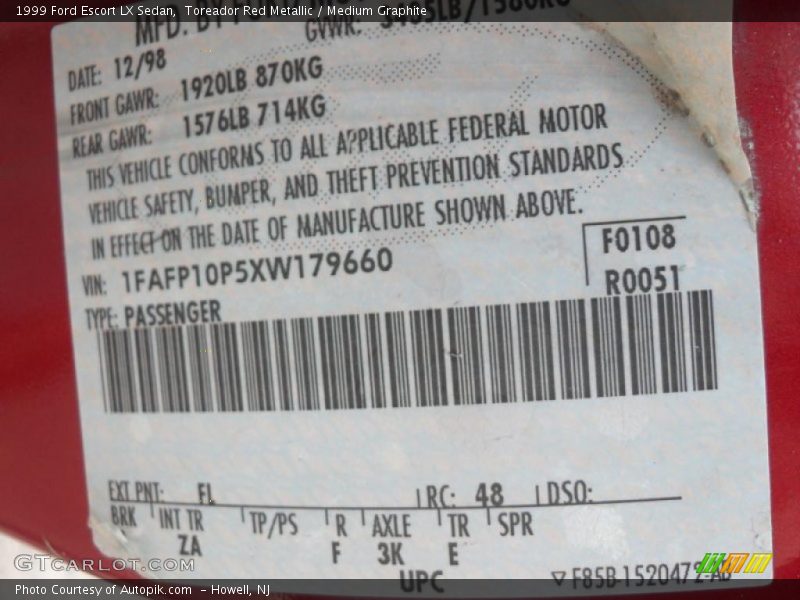 Toreador Red Metallic / Medium Graphite 1999 Ford Escort LX Sedan