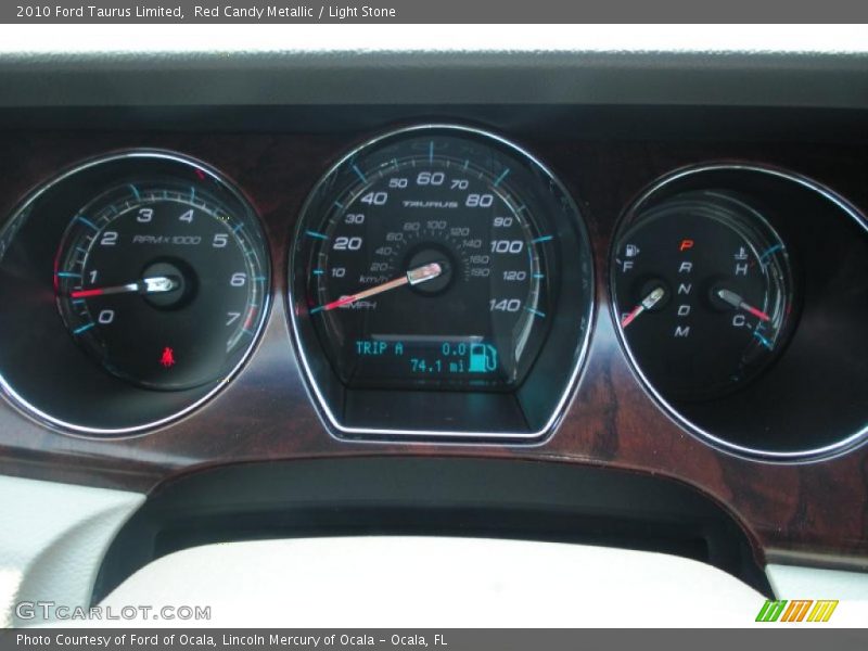 Red Candy Metallic / Light Stone 2010 Ford Taurus Limited