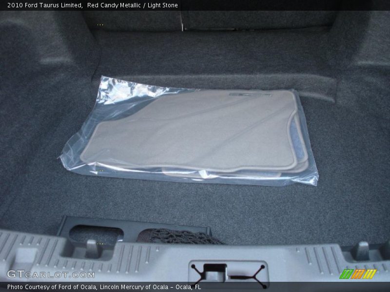 Red Candy Metallic / Light Stone 2010 Ford Taurus Limited