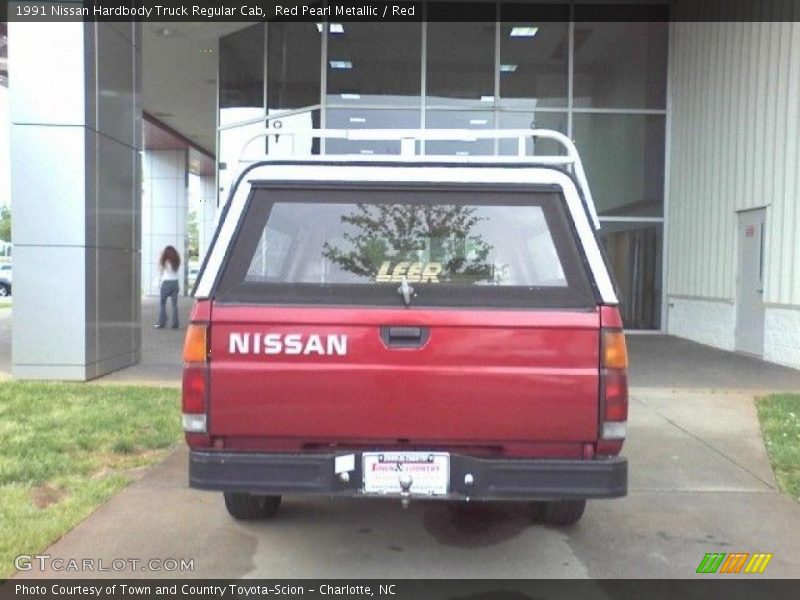 Red Pearl Metallic / Red 1991 Nissan Hardbody Truck Regular Cab