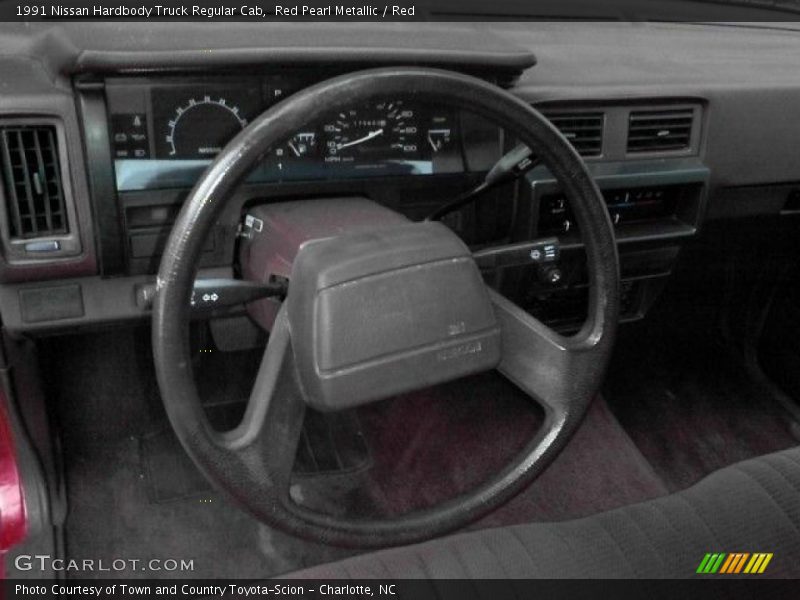 Red Pearl Metallic / Red 1991 Nissan Hardbody Truck Regular Cab