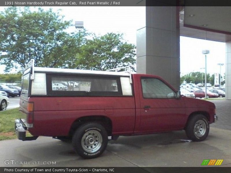 Red Pearl Metallic / Red 1991 Nissan Hardbody Truck Regular Cab