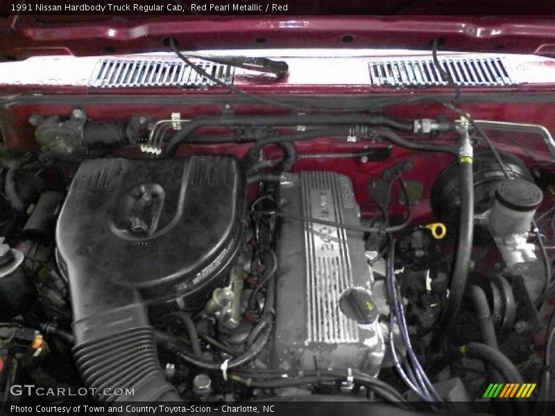 Red Pearl Metallic / Red 1991 Nissan Hardbody Truck Regular Cab