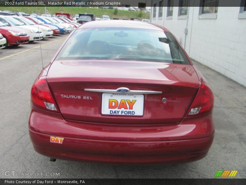 Matador Red Metallic / Medium Graphite 2002 Ford Taurus SEL