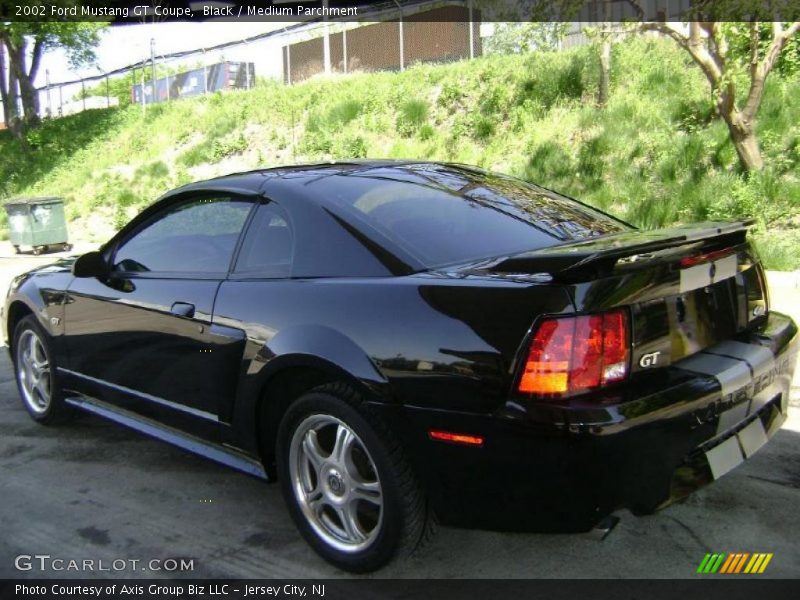 Black / Medium Parchment 2002 Ford Mustang GT Coupe