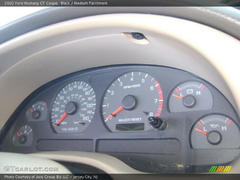 Black / Medium Parchment 2002 Ford Mustang GT Coupe