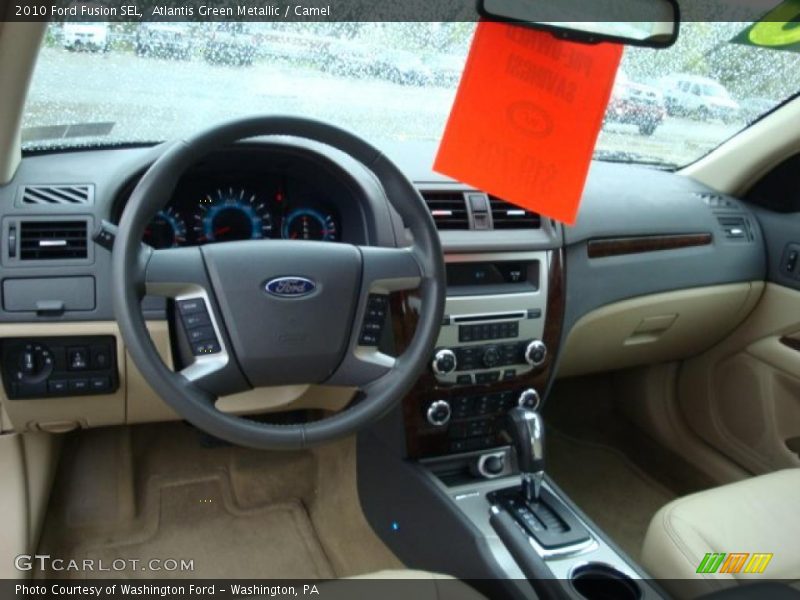Atlantis Green Metallic / Camel 2010 Ford Fusion SEL