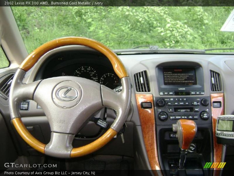 Burnished Gold Metallic / Ivory 2002 Lexus RX 300 AWD