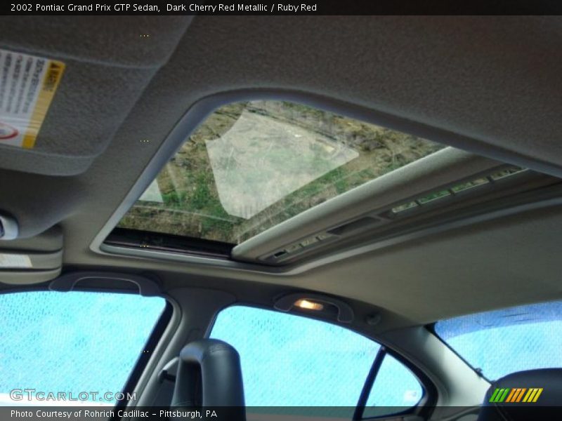 Dark Cherry Red Metallic / Ruby Red 2002 Pontiac Grand Prix GTP Sedan