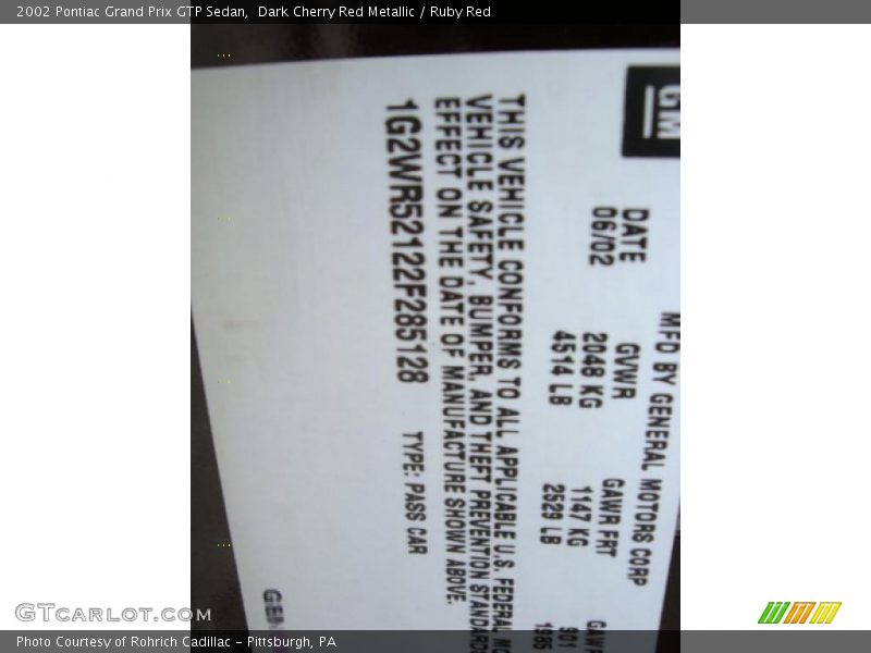 Dark Cherry Red Metallic / Ruby Red 2002 Pontiac Grand Prix GTP Sedan
