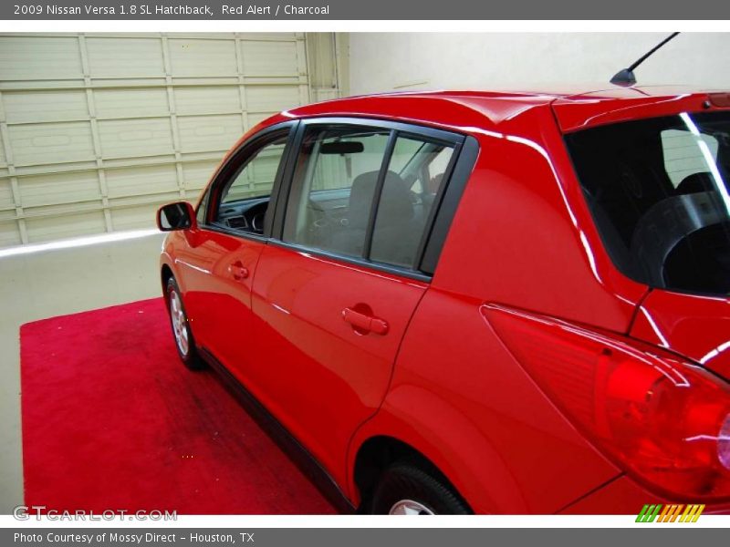 Red Alert / Charcoal 2009 Nissan Versa 1.8 SL Hatchback