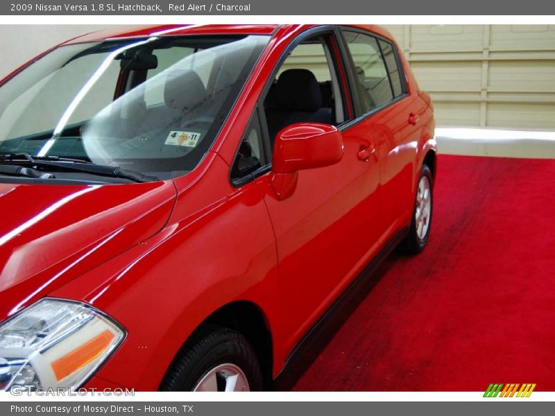 Red Alert / Charcoal 2009 Nissan Versa 1.8 SL Hatchback
