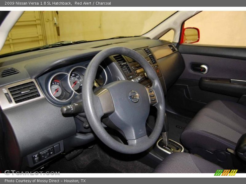 Red Alert / Charcoal 2009 Nissan Versa 1.8 SL Hatchback