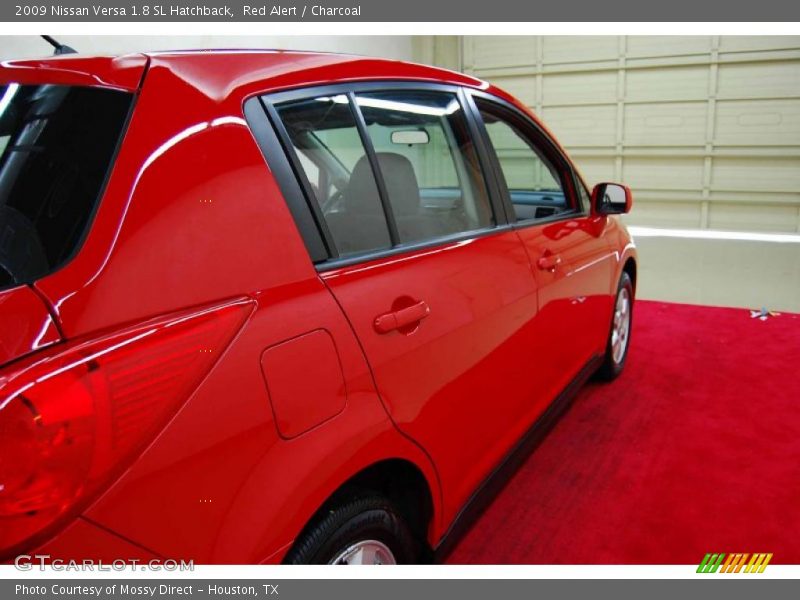 Red Alert / Charcoal 2009 Nissan Versa 1.8 SL Hatchback