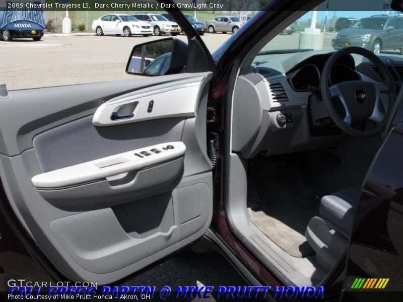 Dark Cherry Metallic / Dark Gray/Light Gray 2009 Chevrolet Traverse LS