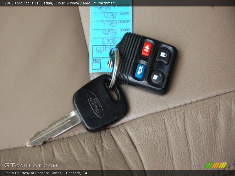 Cloud 9 White / Medium Parchment 2003 Ford Focus ZTS Sedan
