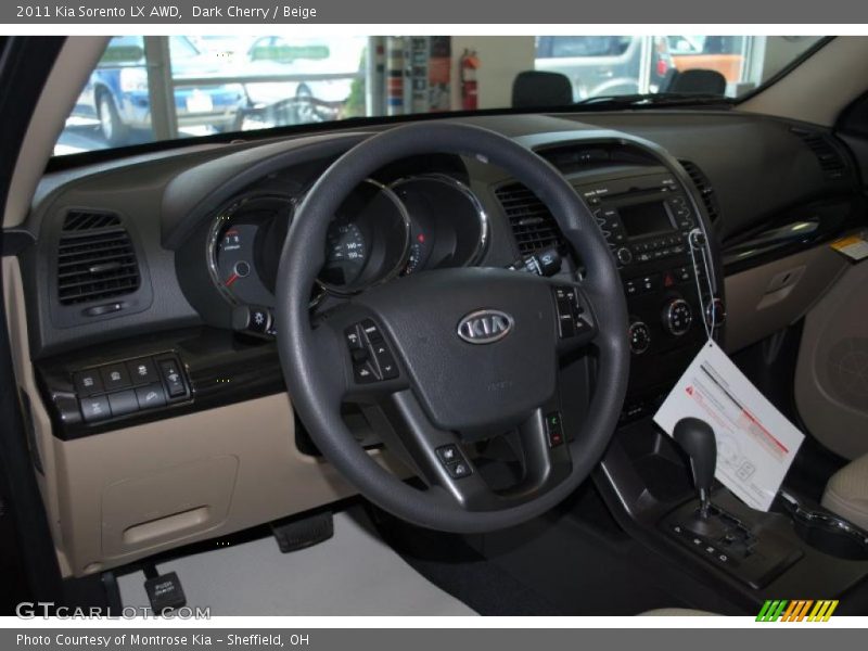 Dark Cherry / Beige 2011 Kia Sorento LX AWD